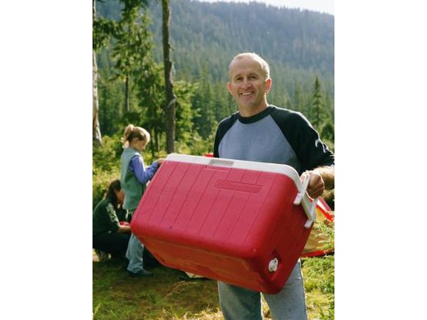 Man holding picnic cooler