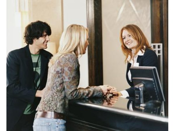 Concierge talking with hotel guests