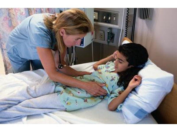 Nurse attending to patient in hosptial