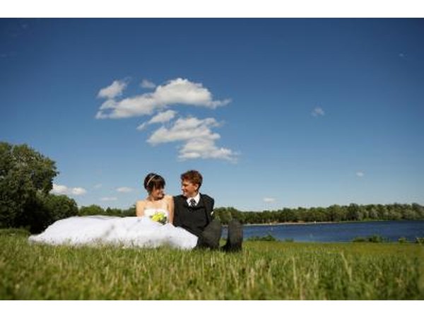 Outdoor wedding near lake.