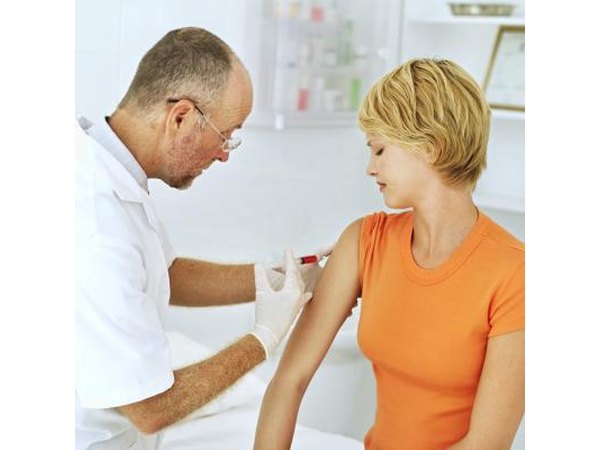 A woman gets her blood drawn.