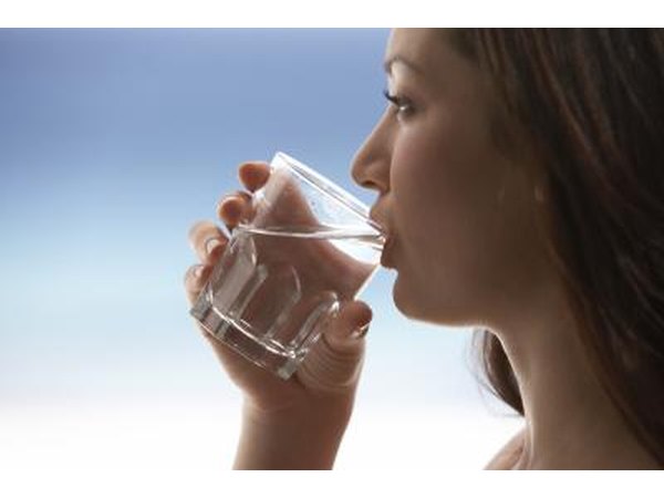 woman taking medications