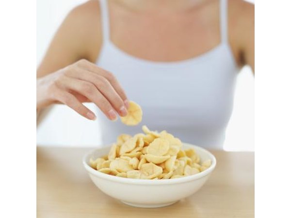 Avoid eating salty foods such as pretzels and chips because they promote water retention