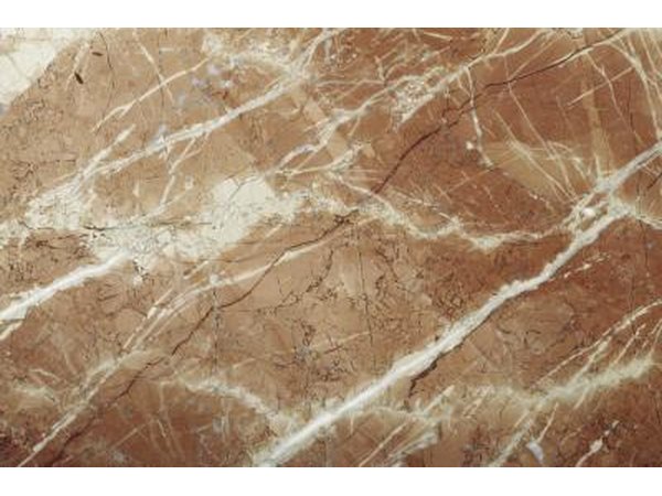 Marbelizing is a faux finish that mimics the pattern of natural stone.