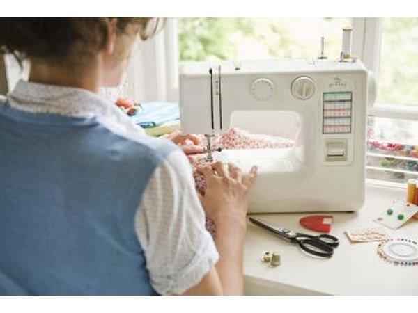Woman using sewing machine