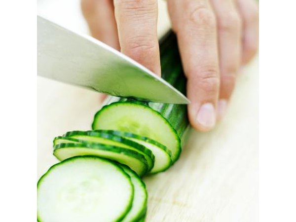Cucumber being sliced