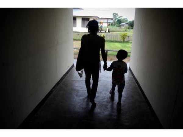 Mother with child in hallway
