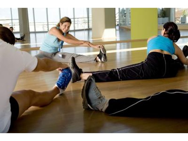 A class stretches before their workout.