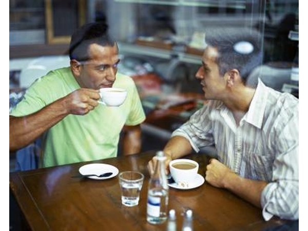Men talking over coffee