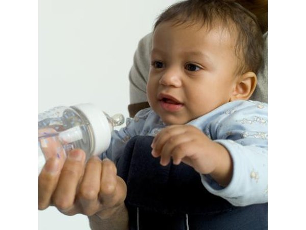 Bottle feed baby.