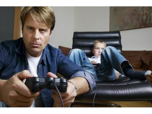 Father and son about to play video game