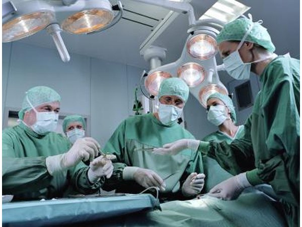 Surgeons operating.