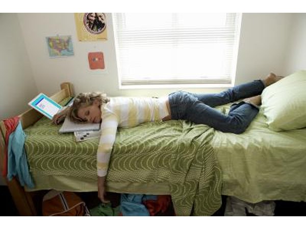Woman lying on bed