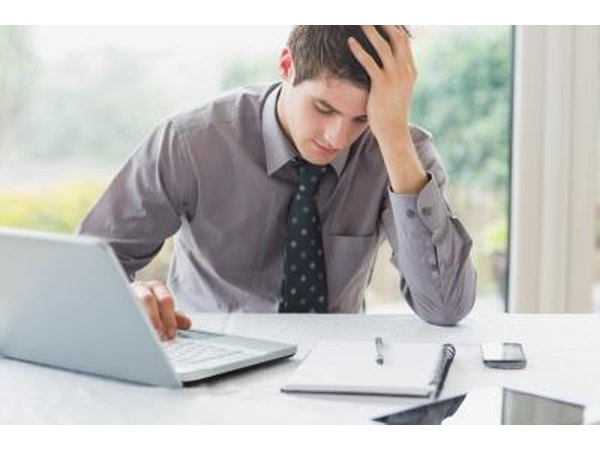 Man under stress at work
