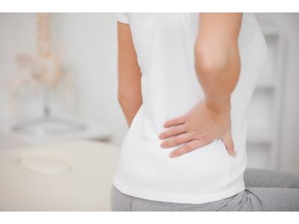 Acid reflux pain may radiate to the back.