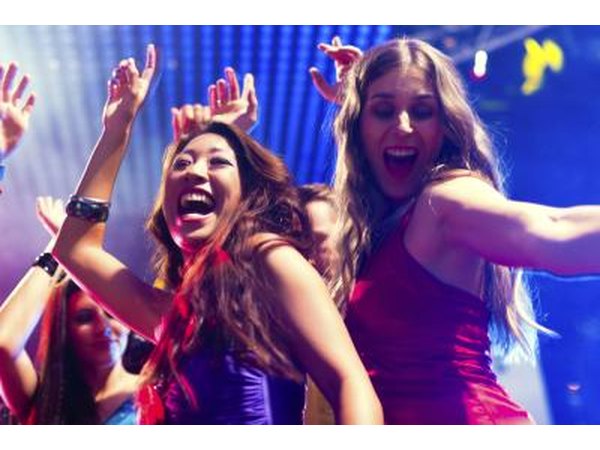 Young women dancing at club