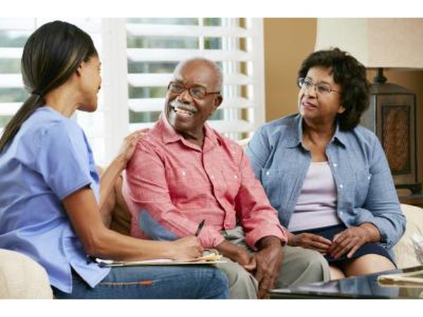 Nurse visiting patient at home