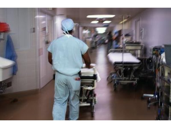 Hospital transporter in hallway