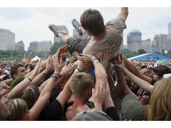 Crowd surfer at concert