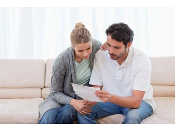 Couple reading mail