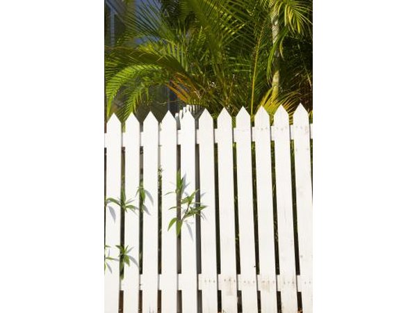 Use the shape of a picket fence to hide cords along the baseboard.