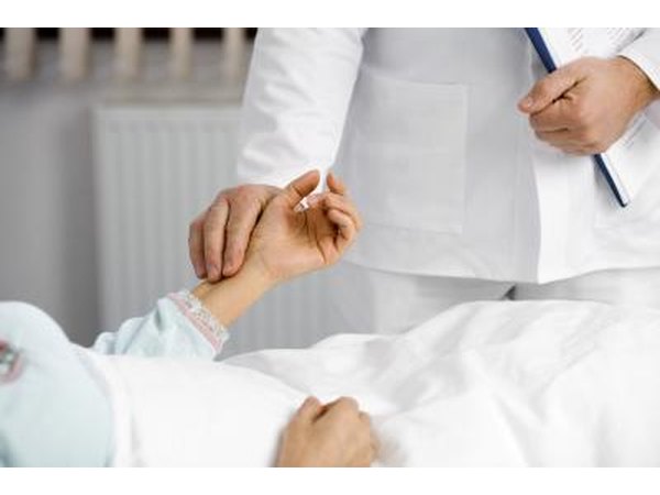 Checking a pulse.