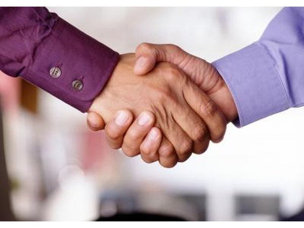two men shaking hands