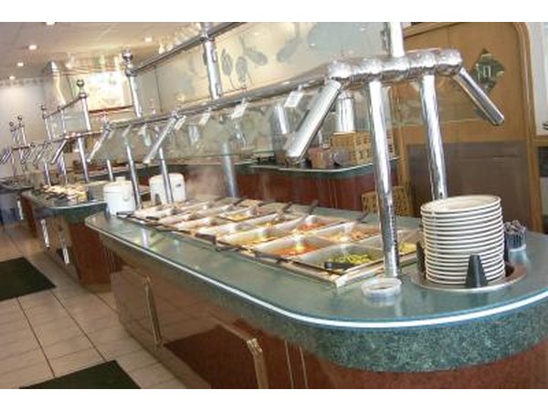 A buffet in a restaurant is ready for patrons.