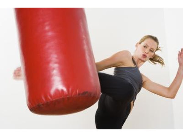 Woman kick boxing