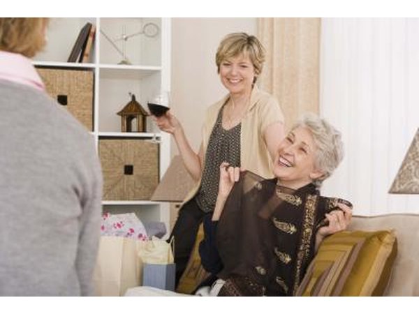 Woman laughing at birthday party