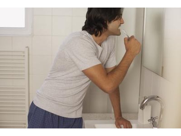 Man brushing teeth