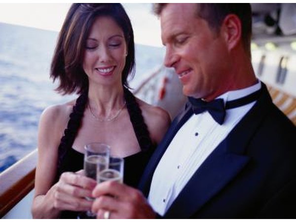 Man wearing a tuxedo on boat