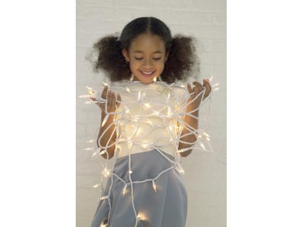 Girl holding lights