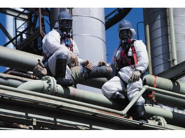 Asbestos removal team at industrial site