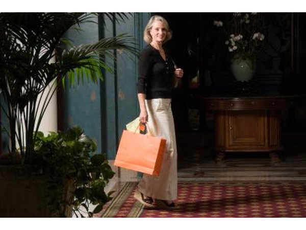 A tote bag is useful and simple to put together out of plastic canvas.