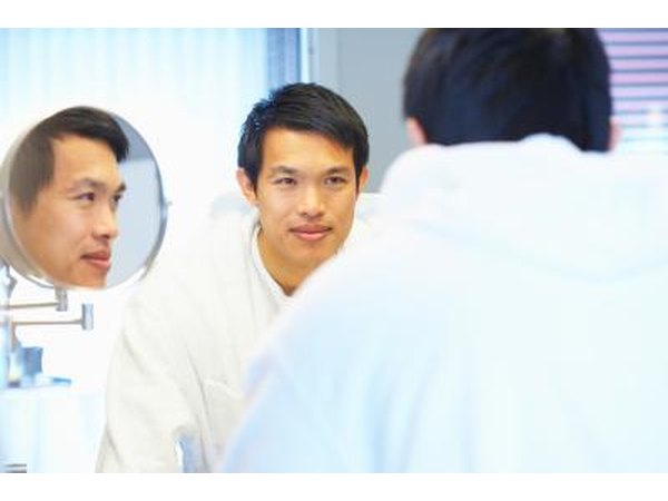 Man looking in mirror