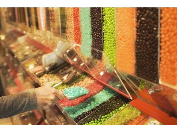 man picking out blue candy