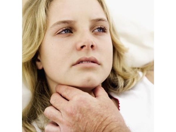 Symptoms may resemble a sore throat.