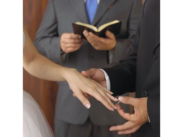 Minister with bride and groom