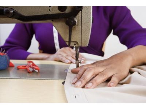 Woman using sewing machine