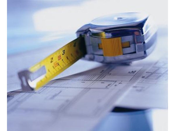 Tape measure on blueprints.