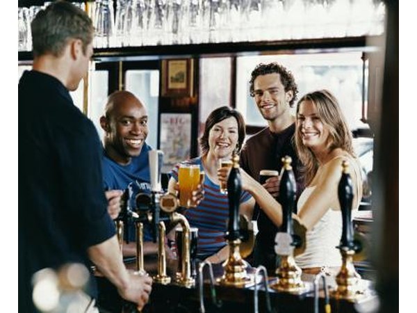 Group of friends drinking at a bar.
