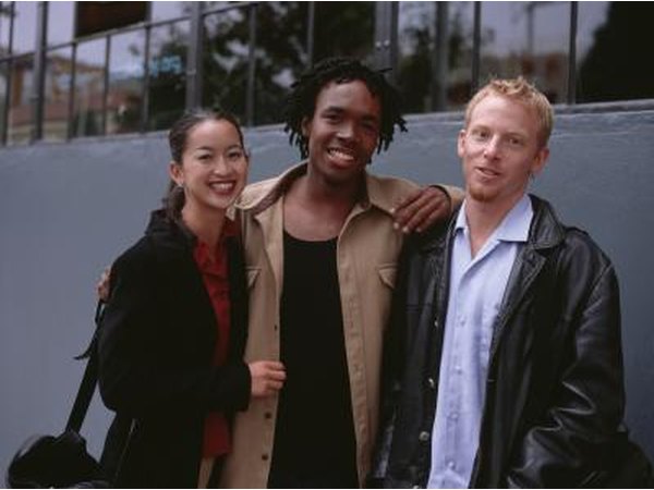 3 friends meet outside.
