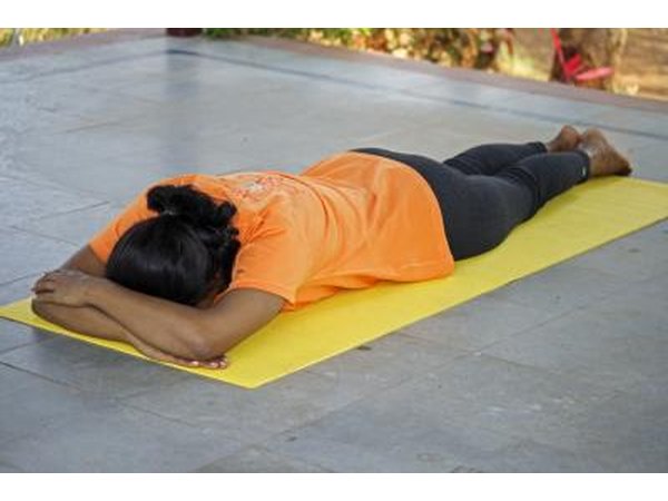 Start by laying on your stomach