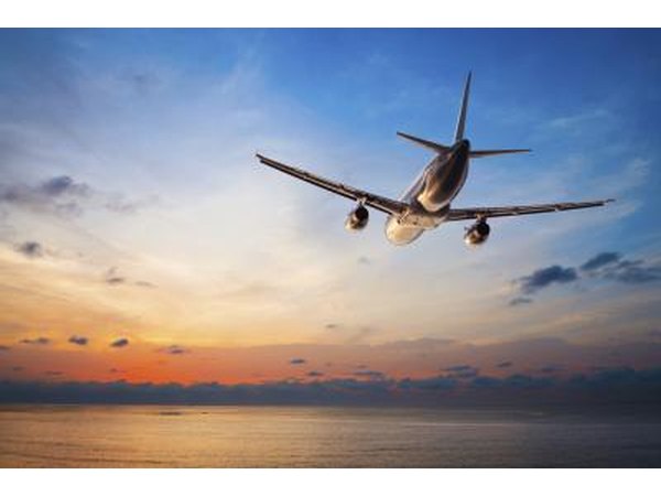 Airplane flying over water