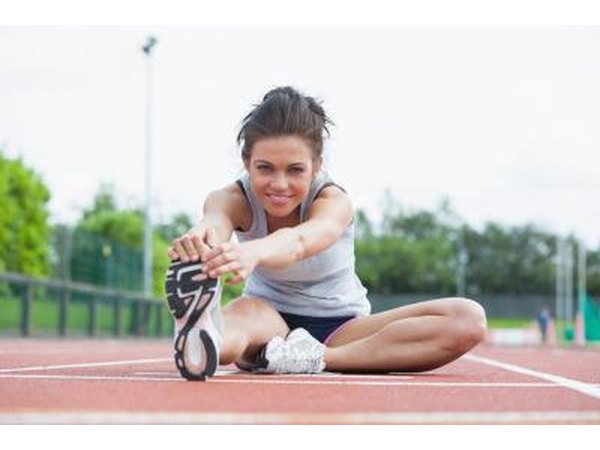 Woman stretches before exercising