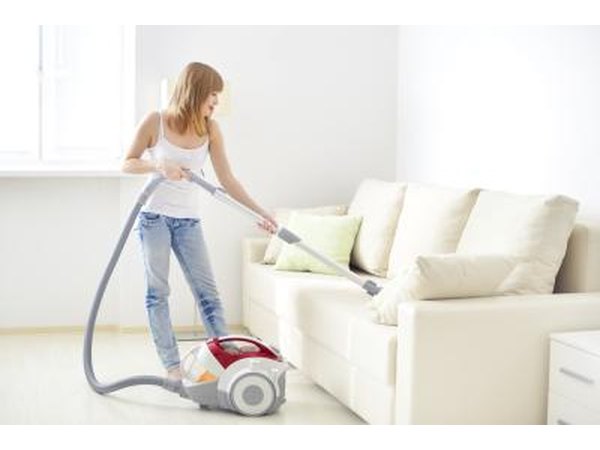 Vacuuming sofa