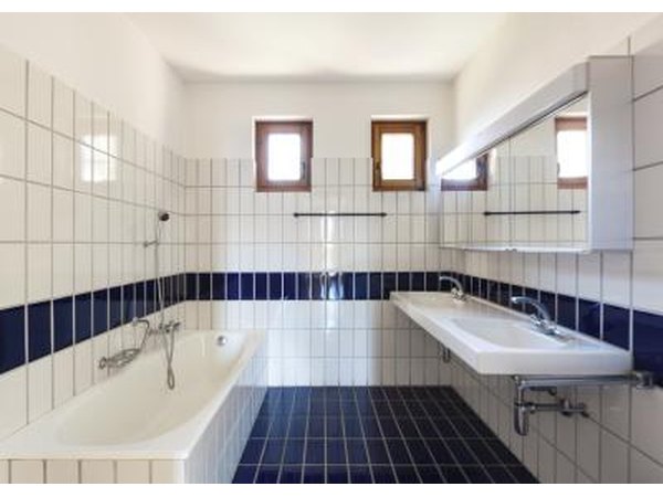 Accent your bathroom with navy blue tiles.