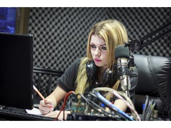 Radio DJ in front of a microphone