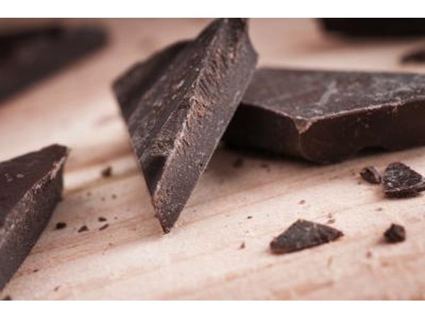 Dark chocolate on a cutting board.